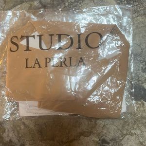 Fresh in the plastic, new with tags and waiting to be worn by you!